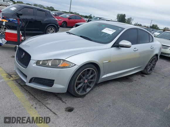2015 Jaguar XF V6 Portfolio with VIN SAJWA0F79F8U77985, listed as a IAAI auction lot 41386030 with 81,335 mi miles. Bid and sale history available at carsss.com. Image 2.