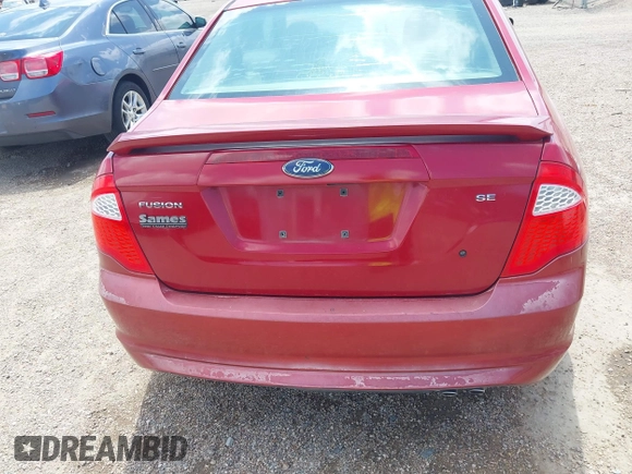 2010 Ford Fusion SE z VIN 3FAHP0HA2AR262234, wystawiony jako IAAI lot #42445664 z przebiegiem 85 912 mil mil oraz . Historia ofert i sprzedaży dostępna na DreamBid. Obrazek 6.