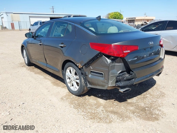 2013 Kia Optima LX with VIN 5XXGM4A74DG093454, listed as a IAAI auction lot 42004990 with 176,667 mi miles. Bid and sale history available at carsss.com. Image 3.