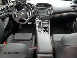 2023 Nissan Maxima SR with VIN 1N4AA6EV8PC506487, listed as a Copart auction lot 66585654 with 770 mi miles and Salvage title. Bid and sale history available at DreamBid. Image 8.