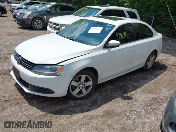 2013 Volkswagen Jetta TDI w/Premium/Nav with VIN 3VWLL7AJ9DM300544, listed as a IAAI auction lot 42401610 with 157,585 mi miles and . Bid and sale history available at DreamBid. Image 2.
