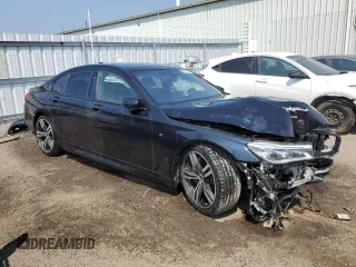2017 BMW 7 Series 750i xDrive with VIN WBA7B0C57HG527064, listed as a Copart auction lot 62463405 with 103,454 mi miles and Salvage title. Bid and sale history available at DreamBid. Image 4.