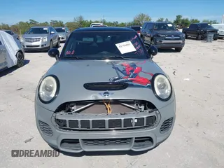 2016 MINI Hardtop John Cooper Works with VIN WMWXM9C58GT996815, listed as a IAAI auction lot 41756661 with 146,450 mi miles and . Bid and sale history available at DreamBid. Image 12.