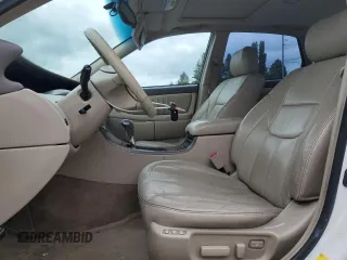 2001 Toyota Avalon XL z VIN 4T1BF28B31U136069, wystawiony jako Copart lot #57355025 z przebiegiem 217 489 mil mil oraz Szkody całkowita. Historia ofert i sprzedaży dostępna na DreamBid. Obrazek 7.