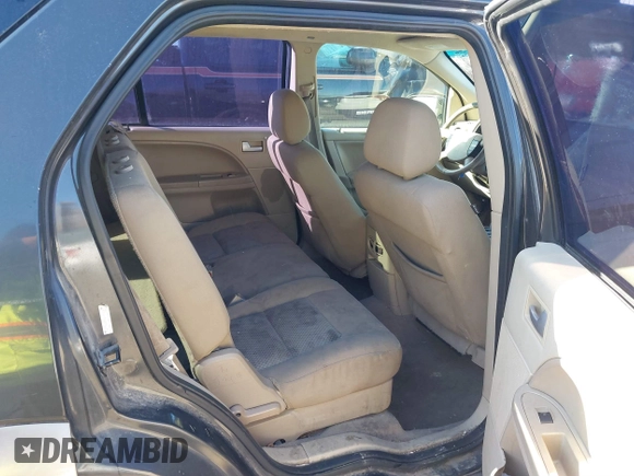 2007 Ford Freestyle SEL z VIN 1FMDK021X7GA39936, wystawiony jako IAAI lot #41686286 z przebiegiem 263 088 mil mil oraz . Historia ofert i sprzedaży dostępna na DreamBid. Obrazek 8.