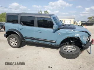 2022 Ford Bronco with VIN 1FMDE5DH3NLB05164, listed as a Copart auction lot 54131195 with 29,052 mi miles and Salvage title. Bid and sale history available at DreamBid. Image 4.