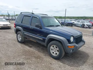 2002 Jeep Liberty Sport with VIN 1J4GL48K42W260513, listed as a IAAI auction lot 42163192 with 146,789 mi miles. Bid and sale history available at carsss.com. Image 1.