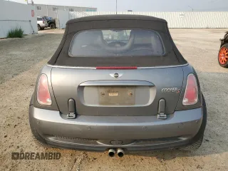 2005 MINI Convertible S z VIN WMWRH33535TF83436, wystawiony jako Copart lot #63962304 z przebiegiem 246 932 mil mil oraz Szkoda całkowita • Salvage title. Historia ofert i sprzedaży dostępna na DreamBid. Obrazek 6.