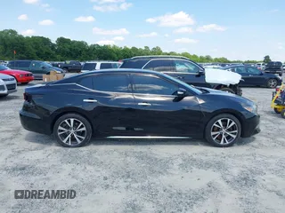 2016 Nissan Maxima SL z VIN 1N4AA6AP1GC381727, wystawiony jako IAAI lot #42275430 z przebiegiem 89 529 mil mil oraz . Historia ofert i sprzedaży dostępna na DreamBid. Obrazek 14.