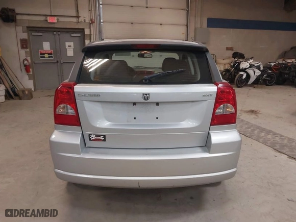 2007 Dodge Caliber SXT with VIN 1B3HB48B07D513778, listed as a IAAI auction lot 41260699 with NaN miles. Bid and sale history available at carsss.com. Image 20.
