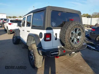 2022 Jeep Wrangler Unlimited Rubicon with VIN 1C4HJXFN4NW123803, listed as a IAAI auction lot 40994742 with 36,156 mi miles and . Bid and sale history available at DreamBid. Image 3.