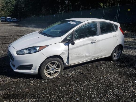 2018 Ford Fiesta SE with VIN 3FADP4EJ1JM128130, listed as a Copart auction lot 50574285 with 141,002 mi miles and Salvage Title. Bid and sale history available at DreamBid. Image 1.