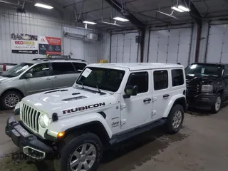 2018 Jeep Wrangler Unlimited Sahara z VIN 1C4HJXEG3JW117990, wystawiony jako IAAI lot #42290861 z przebiegiem 86 907 mil mil oraz . Historia ofert i sprzedaży dostępna na DreamBid. Obrazek 6.