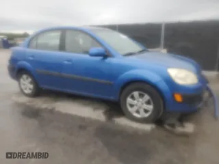 2009 Kia Rio SX with VIN KNADE223896572348, listed as a Copart auction lot 51949235 with 161,546 mi miles and Salvage Title. Bid and sale history available at carsss.com. Image 4.