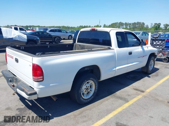 1999 Dodge Dakota SLT z VIN 1B7GL22X0XS193423, wystawiony jako IAAI lot #42053562 z przebiegiem 209 802 mil mil oraz . Historia ofert i sprzedaży dostępna na DreamBid. Obrazek 4.