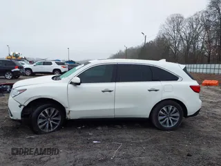 2016 Acura MDX w/Tech with VIN 5FRYD3H49GB008253, listed as a IAAI auction lot 41564115 with 127,500 mi miles. Bid and sale history available at carsss.com. Image 14.