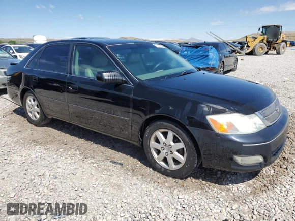 2000 Toyota Avalon XL with VIN 4T1BF28B1YU051192, listed as a Copart auction lot 57316755 with 275,671 mi miles and Salvage title. Bid and sale history available at DreamBid. Image 4.