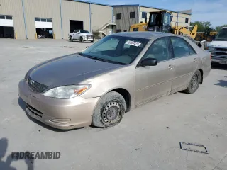 2002 Toyota Camry LE z VIN 4T1BE32K02U520667, wystawiony jako Copart lot #50904425 z przebiegiem 199 574 mil mil oraz Szkoda całkowita • Salvage title. Historia ofert i sprzedaży dostępna na DreamBid. Obrazek 1.