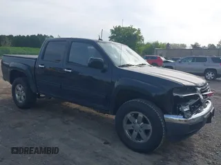 2010 GMC Canyon SLE1 z VIN 1GTJTCDEXA8109443, wystawiony jako IAAI lot #42240716 z przebiegiem 160 500 mil mil oraz . Historia ofert i sprzedaży dostępna na DreamBid. Obrazek 1.