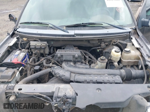 2005 Ford F-150 XLT with VIN 1FTPW12555KE71004, listed as a IAAI auction lot 42023000 with 185,051 mi miles. Bid and sale history available at carsss.com. Image 10.
