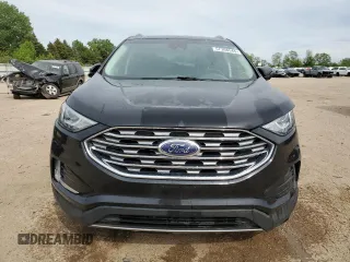 2019 Ford Edge Titanium with VIN 2FMPK4K93KBB42822, listed as a Copart auction lot 57308545 with 102,252 mi miles and Salvage title. Bid and sale history available at DreamBid. Image 5.