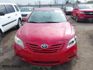 2007 Toyota Camry CE with VIN 4T1BE46K77U109046, listed as a IAAI auction lot 41870289 with 129,027 mi miles. Bid and sale history available at carsss.com. Image 13.