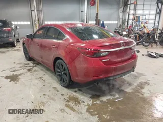 2016 Mazda Mazda6 i Grand Touring with VIN JM1GJ1W54G1432681, listed as a IAAI auction lot 41624888 with 100,410 mi miles. Bid and sale history available at carsss.com. Image 3.