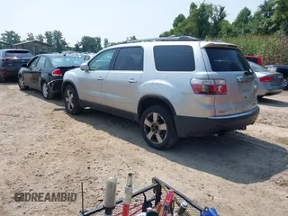2010 GMC Acadia SLT1 with VIN 1GKLVMED2AJ199716, listed as a IAAI auction lot 42154966 with 200,493 mi miles. Bid and sale history available at carsss.com. Image 3.