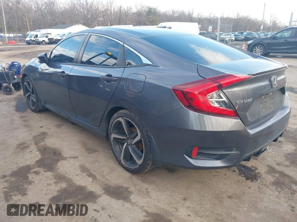 2019 Honda Civic Sport with VIN 2HGFC2F8XKH503867, listed as a IAAI auction lot 41533506 with 66,650 mi miles and . Bid and sale history available at DreamBid. Image 3.