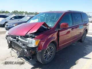 2017 Dodge Grand Caravan SXT with VIN 2C4RDGCG6HR629633, listed as a IAAI auction lot 41997303 with 128,898 mi miles and . Bid and sale history available at DreamBid. Image 2.