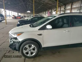 2015 Ford Escape SE with VIN 1FMCU9GX2FUB49175, listed as a Copart auction lot 54582125 with 90,544 mi miles and Salvage Title. Bid and sale history available at DreamBid. Image 14.