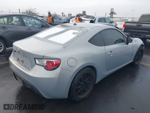 2013 Scion FR-S with VIN JF1ZNAA1XD1729862, listed as a IAAI auction lot 41143862 with 64,208 mi miles. Bid and sale history available at carsss.com. Image 4.
