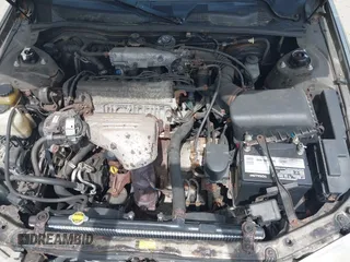 2001 Toyota Camry CE z VIN 4T1BG22K51U032141, wystawiony jako IAAI lot #42332835 z przebiegiem 143 313 mil mil oraz . Historia ofert i sprzedaży dostępna na DreamBid. Obrazek 10.