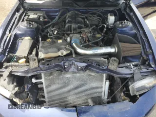 2010 Ford Mustang V6 with VIN 1ZVBP8AN7A5166515, listed as a Copart auction lot 54176615 with 99,390 mi miles and Salvage Title. Bid and sale history available at DreamBid. Image 11.