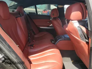 2016 BMW 6 Series 650i xDrive z VIN WBA6D6C57GG388027, wystawiony jako Copart lot #53157535 z przebiegiem 52 147 mil mil oraz Szkody całkowita. Historia ofert i sprzedaży dostępna na DreamBid. Obrazek 10.