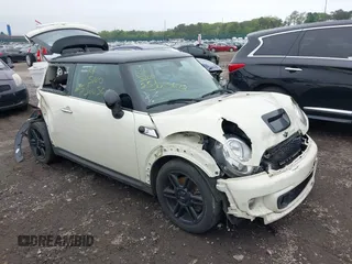 2013 MINI Hardtop S with VIN WMWSV3C51DT480022, listed as a IAAI auction lot 42398793 with Not provided miles and . Bid and sale history available at DreamBid. Image 1.
