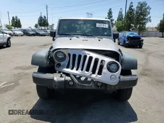 2014 Jeep Wrangler Unlimited Sport with VIN 1C4HJWDG1EL221302, listed as a Copart auction lot 63331015 with 213,912 mi miles and Salvage title. Bid and sale history available at DreamBid. Image 14.