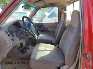 1997 Ford Ranger XLT with VIN 1FTCR11X1VTA20882, listed as a Copart auction lot 70052614 with 211,824 mi miles and Salvage title. Bid and sale history available at DreamBid. Image 7.