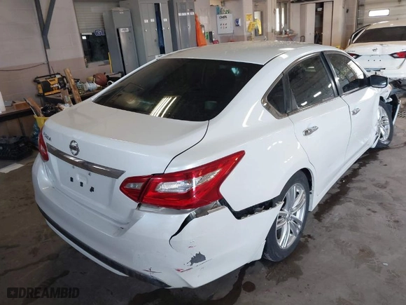 2016 Nissan Altima 2.5 SR with VIN 1N4AL3AP2GN350208, listed as a IAAI auction lot 41839230 with 129,492 mi miles. Bid and sale history available at carsss.com. Image 4.