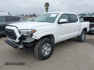 2021 Toyota Tacoma SR with VIN 3TYAX5GNXMT032184, listed as a IAAI auction lot 42204429 with 60,295 mi miles and . Bid and sale history available at DreamBid. Image 2.