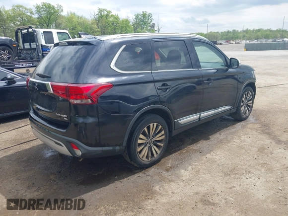 2019 Mitsubishi Outlander SE with VIN JA4AD3A32KZ014039, listed as a IAAI auction lot 42106096 with 179,359 mi miles and . Bid and sale history available at DreamBid. Image 4.