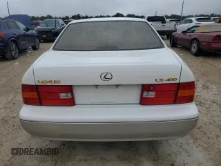 2000 Lexus LS 400 z VIN JT8BH28FXY0178613, wystawiony jako Copart lot #74883444 z przebiegiem Nie podano mil oraz Szkody całkowita. Historia ofert i sprzedaży dostępna na DreamBid. Obrazek 6.