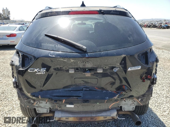2016 Mazda CX-5 Touring with VIN JM3KE4CY2G0867484, listed as a Copart auction lot 54545435 with 100,664 mi miles and Salvage Title. Bid and sale history available at carsss.com. Image 6.