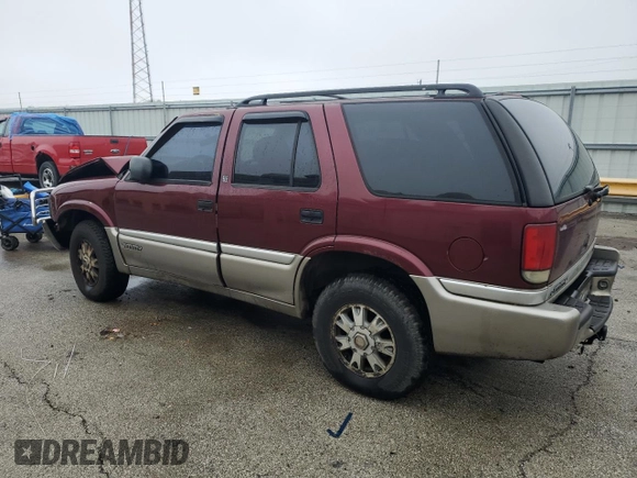2001 GMC Jimmy SLT with VIN 1GKDT13W512219142, listed as a Copart auction lot 85045234 with 0 mi miles and Salvage Title. Bid and sale history available at carsss.com. Image 2.