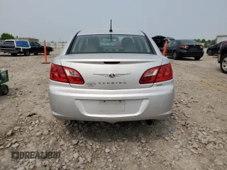 2010 Chrysler Sebring Limited z VIN 1C3CC5FB0AN233881, wystawiony jako Copart lot #58819005 z przebiegiem 162 152 mil mil oraz Nie do naprawy • Non repairable. Historia ofert i sprzedaży dostępna na DreamBid. Obrazek 6.