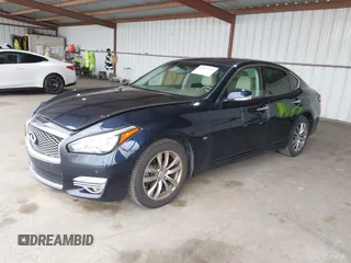 2015 Infiniti Q70 z VIN JN1BY1AP9FM542429, wystawiony jako IAAI lot #41903214 z przebiegiem 139 255 mil mil oraz . Historia ofert i sprzedaży dostępna na DreamBid. Obrazek 2.