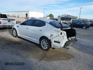 2015 Kia Optima EX with VIN 5XXGN4A77FG437245, listed as a IAAI auction lot 41560539 with 196,480 mi miles and . Bid and sale history available at DreamBid. Image 3.