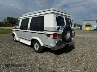 1990 GMC Vandura z VIN 1GDEG25K5L7522525, wystawiony jako Copart lot #75007594 z przebiegiem 91 857 mil mil oraz Szkody całkowita. Historia ofert i sprzedaży dostępna na DreamBid. Obrazek 3.
