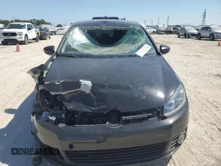 2012 Volkswagen Golf TDI с VIN WVWMM7AJ3CW255913, выставлен на аукционе Copart как лот 72417014 с пробегом 78 965 миль миль и Списание • Salvage title. История ставок и продаж доступна на DreamBid. Изображение 5.