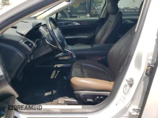 2016 Lincoln MKZ z VIN 3LN6L2GK0GR615898, wystawiony jako Copart lot #62814285 z przebiegiem 231 270 mil mil oraz Szkoda całkowita • Salvage title. Historia ofert i sprzedaży dostępna na DreamBid. Obrazek 7.